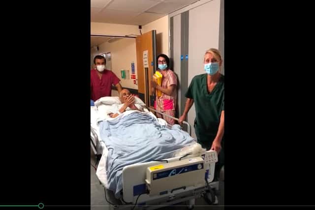 Dr Parthak is applauded out of the ICU. Just a few days later, he felll victim to a stroke and died a week later