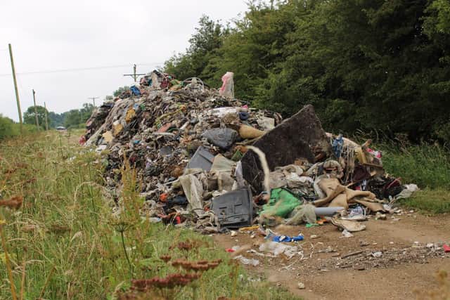 Vandalism - the huge heap of waste dumped by a lorry near Leadenham last week. Photo: Paul Sproxton EMN-200707-122347001