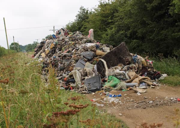 Vandalism - the huge heap of waste dumped by a lorry near Leadenham last week. Photo: Paul Sproxton EMN-200707-122347001