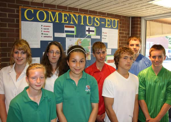 Eight of the nine due to visit Germany’s Das Gymnasiumam Rothenbühl. Pictured
(back, from left) Laura Swain, 15, Harriet Housan, 15, Thomas Lassetter, 15, and Liam
Chambers, 14; (front) Alice Flint, 15, Ama Annous, 12, Nathan McClure, 15, and Sam
Johnson, 15. Unavailable for the shoot, Aiden McClure, 16.
