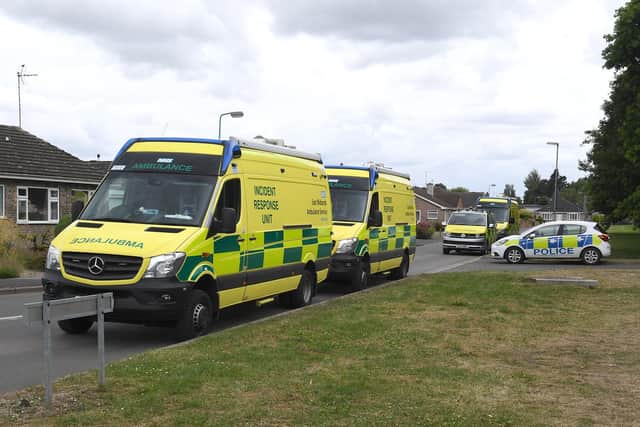 Police, bomb disposal officers, and other emergency services at the scene yesterday