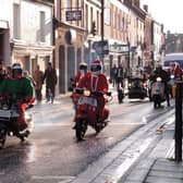 Sleaford Christmas Market will go online and in newsletter form this year due to Covid-19 concerns and the Sleaford All-Knighters Happy Chappy Scooter Run will also be postponed. The scooters are pictured at the launch of last year's Christmas Market. EMN-201007-112717001