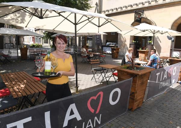 Tiamo open for alfresco dining in Sleaford Market Place. Owner Sam Paulou EMN-200713-134910001