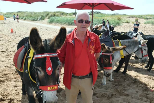 John Nuttall glad to be back on the beach with his donkeys.
