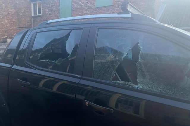 Pictures of the damaged vehicles outside the Boar's Head pub.