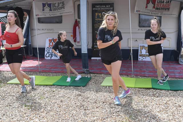 Lisa Jay, Linsey Reeves (red top), Kaci Jayes 16, Lily Jayes 10 performing during the danceathon..