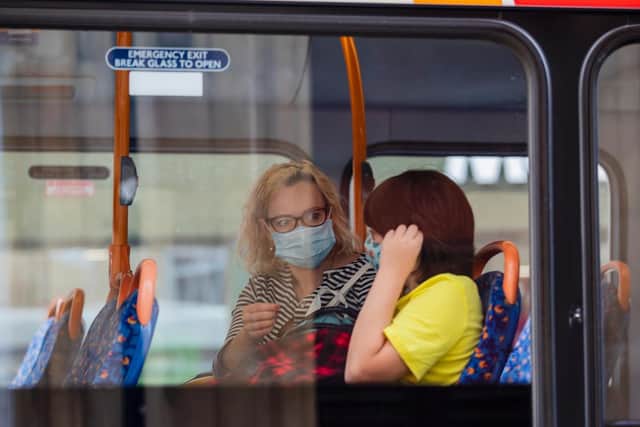 Face coverings are mandatory on buses although there are reports of many not wearing them. Photo: Leila Coker