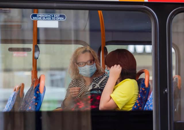 Face coverings are mandatory on buses although there are reports of many not wearing them. Photo: Leila Coker