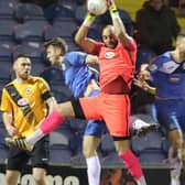 Jon Stewart in action at Stockport County. Photo: Eric Brown