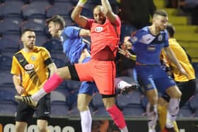 Jon Stewart in action at Stockport County. Photo: Eric Brown