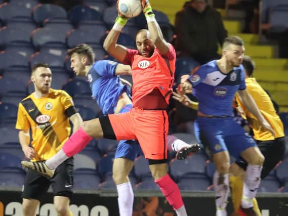 Jon Stewart in action at Stockport County. Photo: Eric Brown