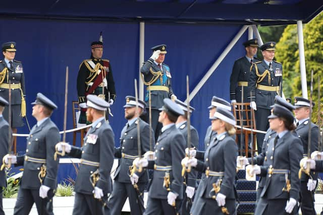 Taking the salute during the march past.