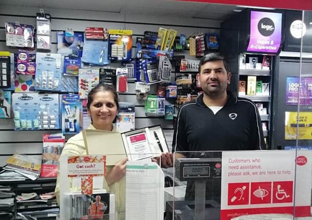 Hira and Ram with their award.