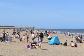 Visitors flocked to the beach in Skegness at the weekend in spite of the Which? survey rating it the worst resort of 100 around the country.