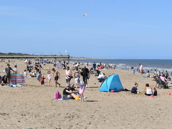 Visitors flocked to the beach in Skegness at the weekend in spite of the Which? survey rating it the worst resort of 100 around the country.