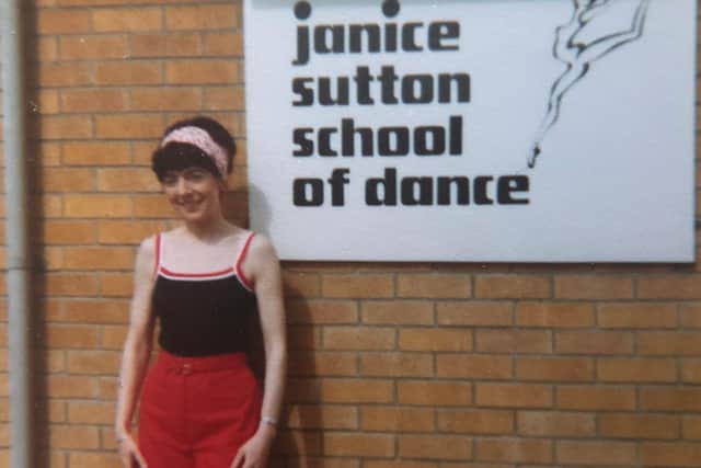 Miss Joy outside the theatre school.