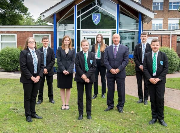 Somercotes Academy Principal Frances Green, alongside CEO of Tollbar Multi Academy Trust David Hampson, and several students. (Picture: Sean Spencer/Hull News & Pictures Ltd.)