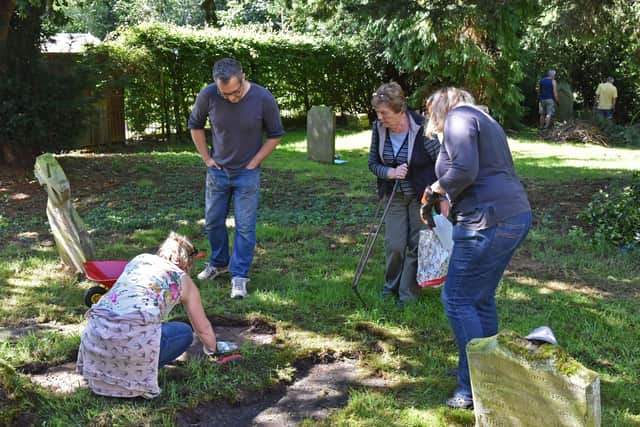 Unearthing lost graves.  Picture John Edwards
