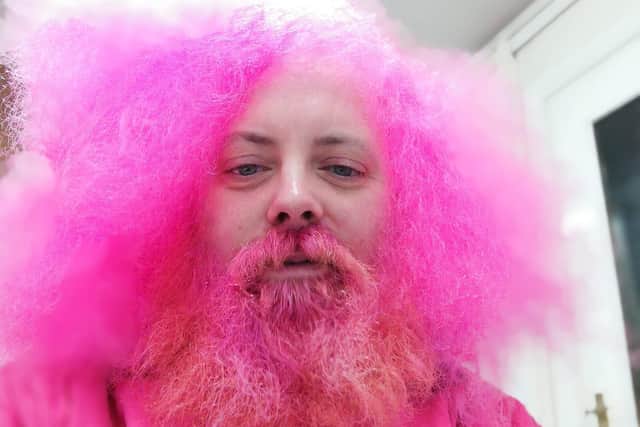 Simon, pictured last year before his pink beard and head shave.