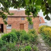 The gardens of Mrs Smith's Cottage.