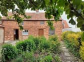 The gardens of Mrs Smith's Cottage.