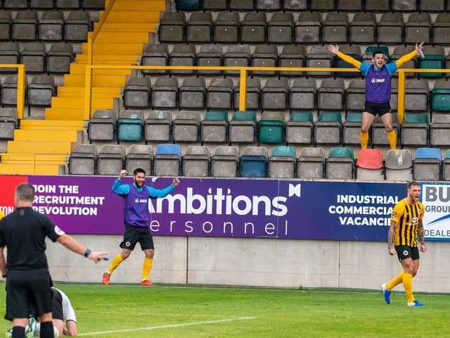 Substitutes Frank Mulhern and Dominic Knowles join in the celebrations.Photo: @RussellDossett (www.sportspictures.online)