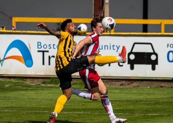 Jay Rollins battles during Saturday's defeat. Photo: Michael Ripley.