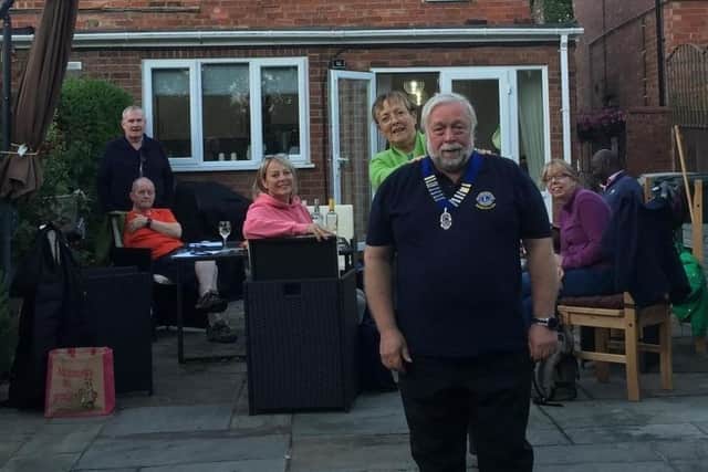 Newly appointed president Richard Brown received the chain of office from past president Bridget Barker. (photo supplied)