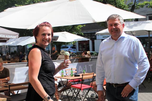 Owner of Tiamo Italian Sam Pavlou (left) and North Kesteven District Council Leader Coun Richard Wright. EMN-200408-181126001