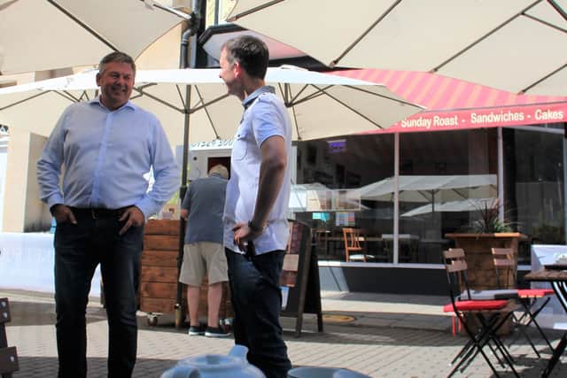 North Kesteven District Council Leader Coun Richard Wright (left) and owner of Market Square Café and Restaurant Tom Pigott. EMN-200408-181137001