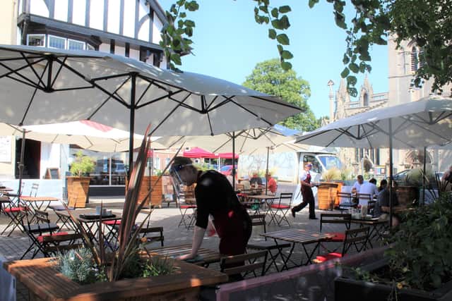 A covid precautions are being carried out for the outdoor dining experience in Sleaford Market Place. EMN-200408-181148001