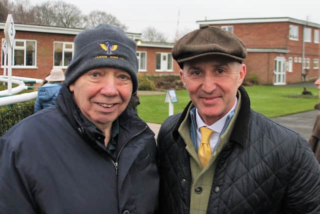 Brigg Trainer Nick Kent (right) celebrates with his friend and Caistor Cricket Club stalwart Wes Allison after his superb Boxing Day success at Market Rasen. EMN-200508-090501001