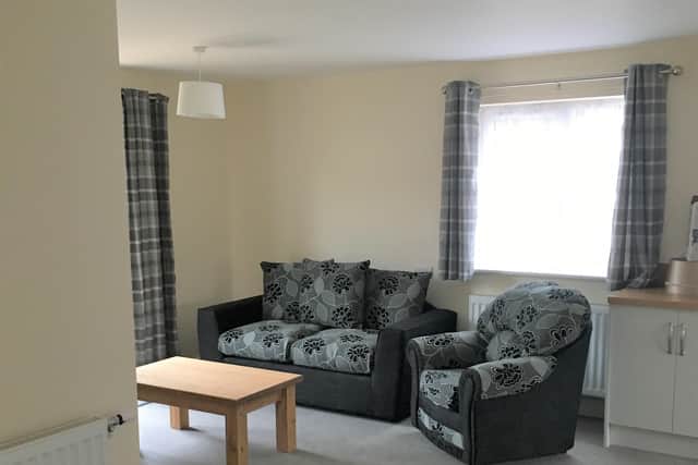 The lounge area of one of the new homes with wide open plan areas to enable easy manoeuvring in a wheelchair and easy low level access work tops. EMN-201008-141313001