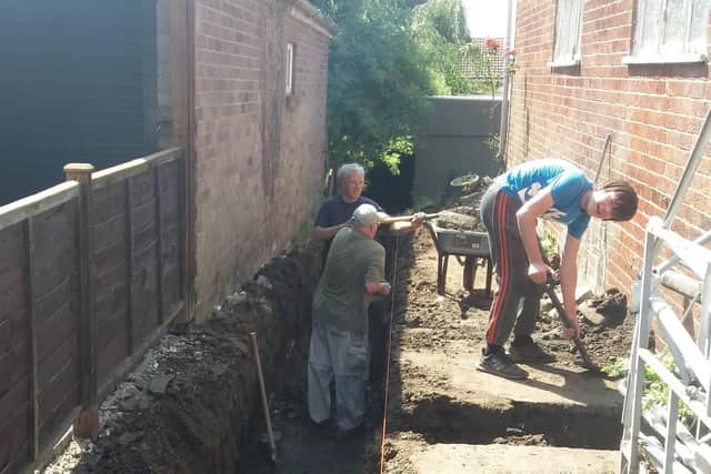 Volunteers digging the footings for the extension to the Spilsby Christian Fellowship church.