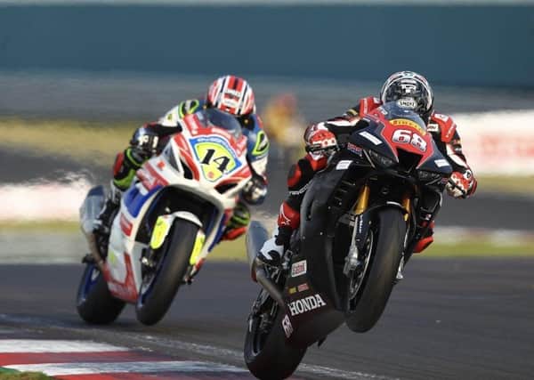 Tom Neave (68) does battle with brother Tim at Donington Park. Photo: Dave Yeomans.