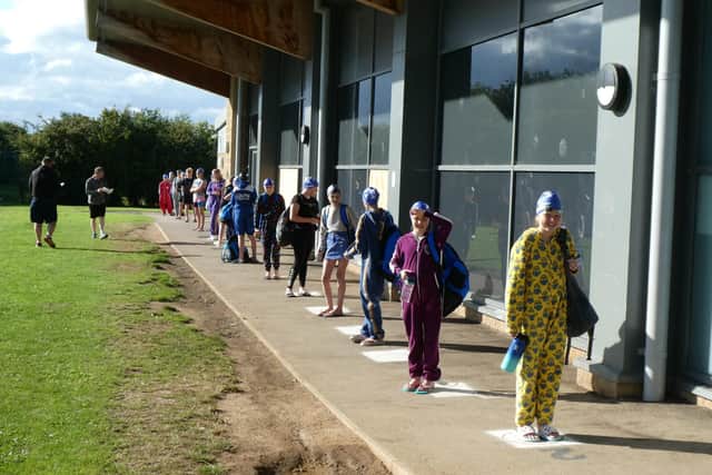 Swimmers arrive ‘beach ready’