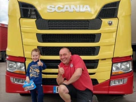 Joe with Fairburns lorry driver Dave Hockenhull; Joe and Fairburns NHS Rainbow Truck;