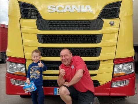 Joe with Fairburns lorry driver Dave Hockenhull; Joe and Fairburns NHS Rainbow Truck;
