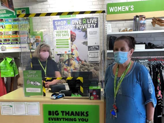 Returning volunteer Helen Housley (left) and Oxfam shop manager Sue
Ray (right) say 'thank you' for all the generous donations from the Skegness
community.