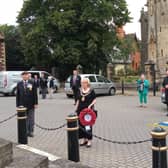 The two minute silence is held for VJ Day in Sleaford Market Place on Saturday. EMN-200817-154654001