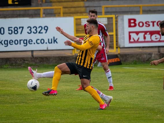 Andi Thanoj in action in the play-off final. Photo: Michael Ripley.