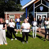 GCSE students celebrate outside Somercotes Academy today with Principal Frances Green. EMN-200820-124425001