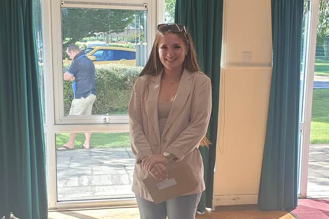 Niamh Belshaw celebrating her GCSE results.