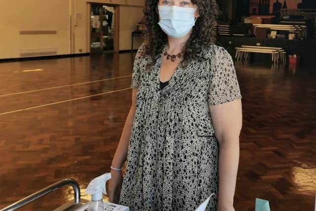 Rachel Keightley, Assistant Headteacher. at William Lovell, manning the cleaning station as students picked up their results