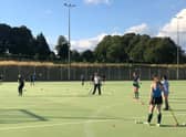 Louth Hockey Club celebrates £5,000 donation towards new artificial pitch.