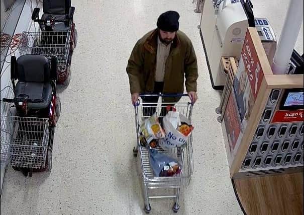 Undated handout photo issued by Hertfordshire Constabulary of Nigel Wright, 45, in a Tesco store.