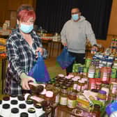 Heckington Community Larder when it opened in Heckington Village Hall in May. Co-ordinator Sue Tucker and Leroy Tucker.