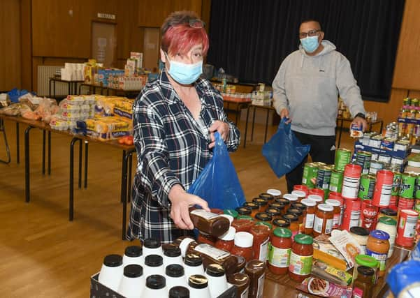 Heckington Community Larder when it opened in Heckington Village Hall in May. Co-ordinator Sue Tucker and Leroy Tucker.