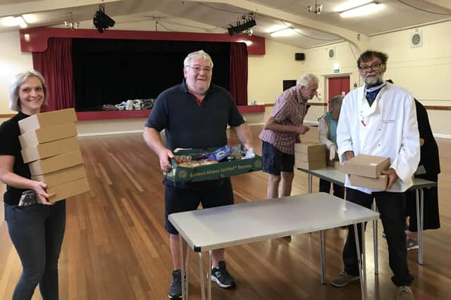 The final teas ready to go out with some of the volunteer drivers. (photo Rhona Sheppard)