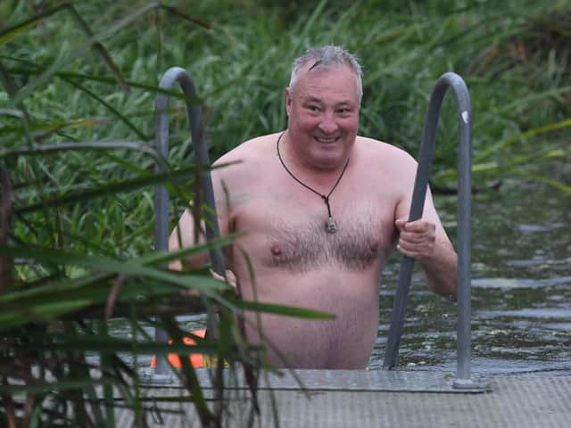 Mark Deith taking the plunge with the Barmy Army.